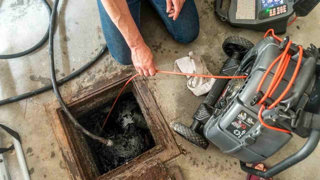 What should I do in case of a sewer line backup in Edgewater, MD?